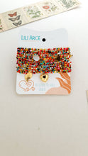 Cargar imagen en el visor de la galería, PULSERA MULTICOLOR DIJES DORADOS
