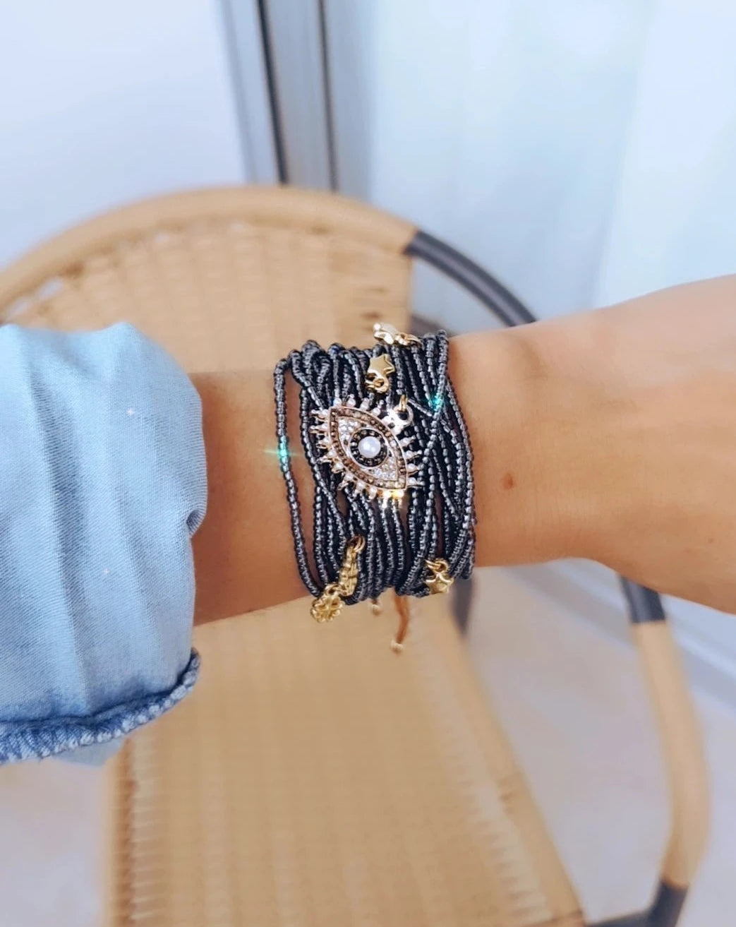 PULSERA MOSTA GRIS OJO