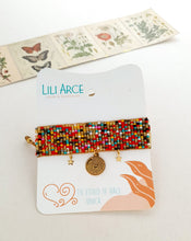 Cargar imagen en el visor de la galería, PULSERA TEJIDA DIJE DORADO
